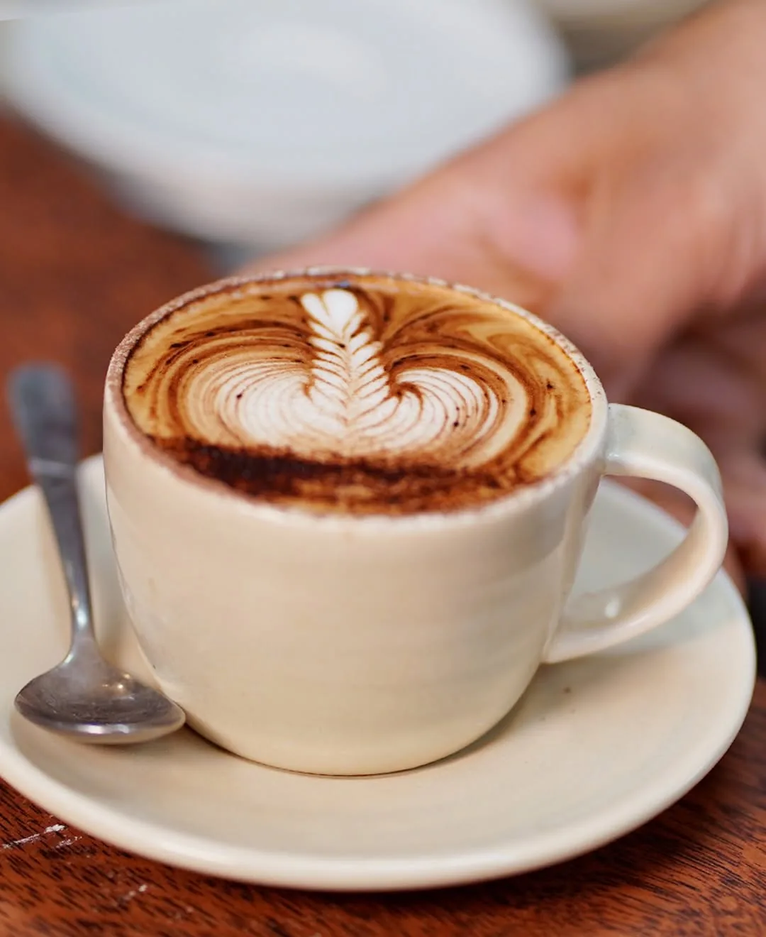 Latte art coffee at Cafe Cosy Moss Vale